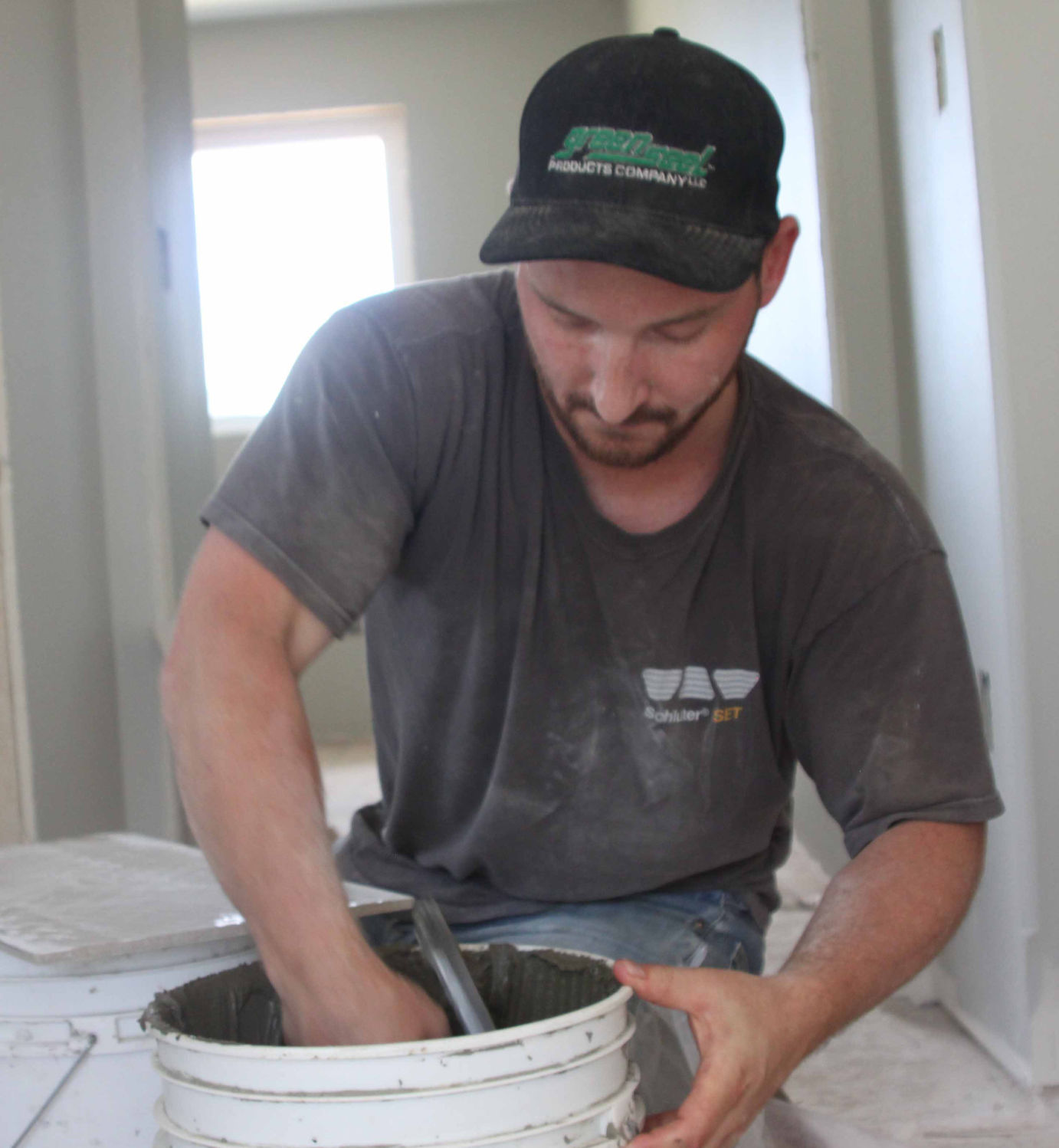 Tyler installs tile 3